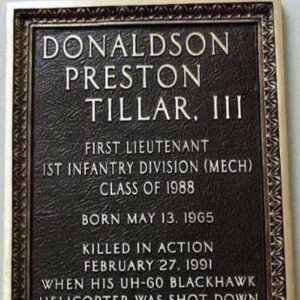 A plaque in the shape of a soldier 's name.